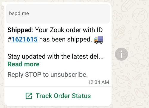 WhatsApp business message from Zouk confirming that order ID #1621615 has been shipped, featuring an emoji, a "Read more" link, and a "Track Order Status" CTA button.